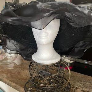 Women’s hat trimmed In chiffon ruffles.